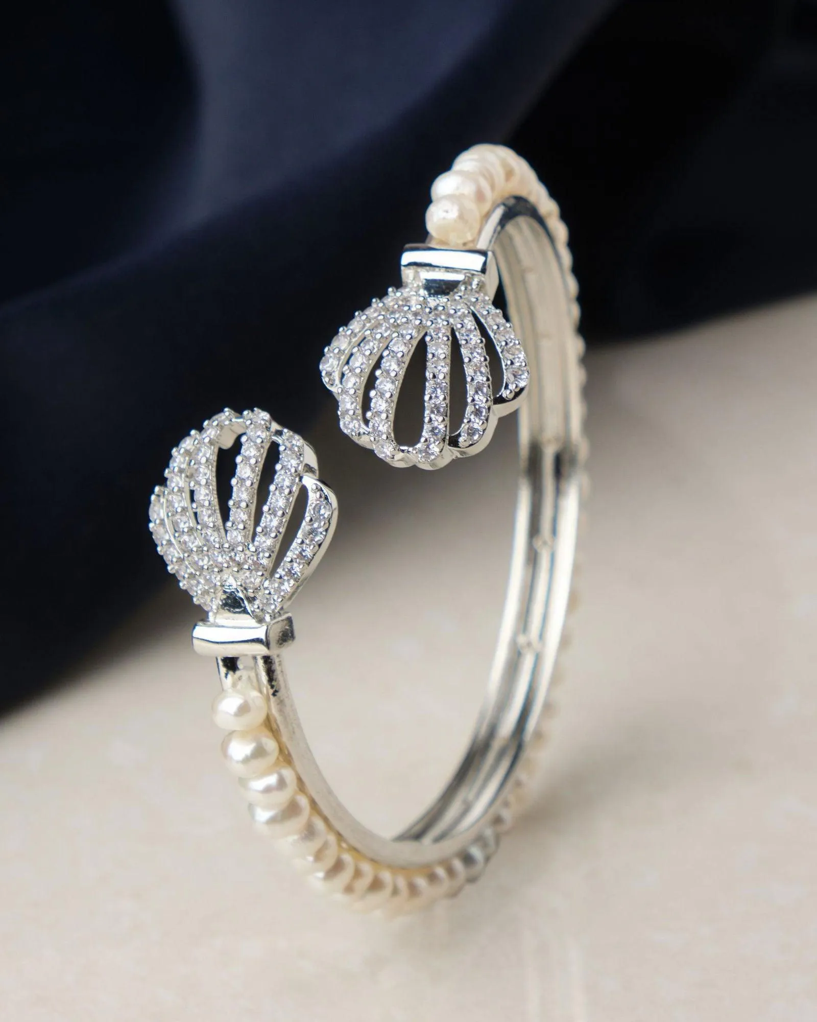 Delightful Stone Studded Pearl Bangle