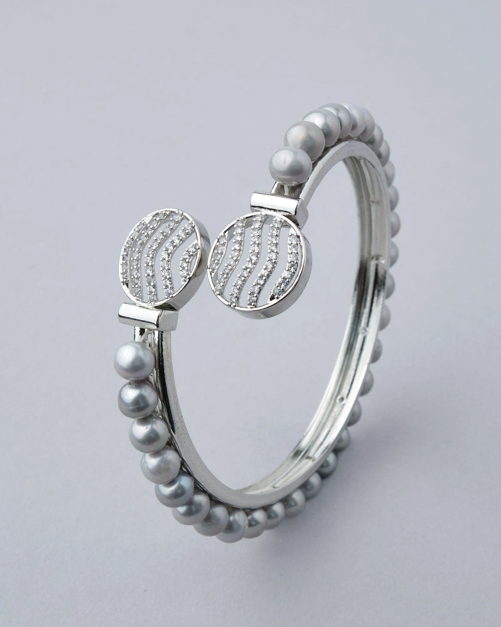 Delightful Stone Studded Pearl Bangle