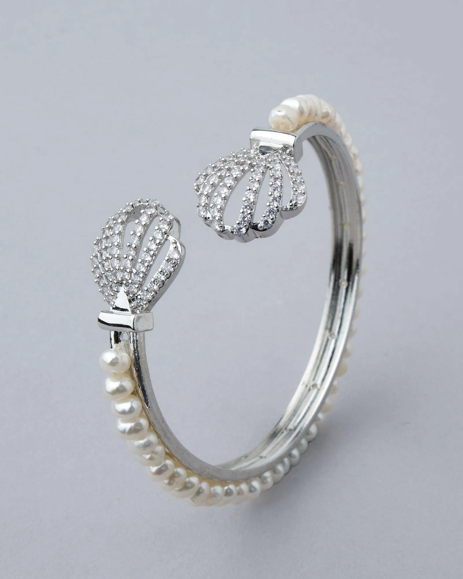 Delightful Stone Studded Pearl Bangle