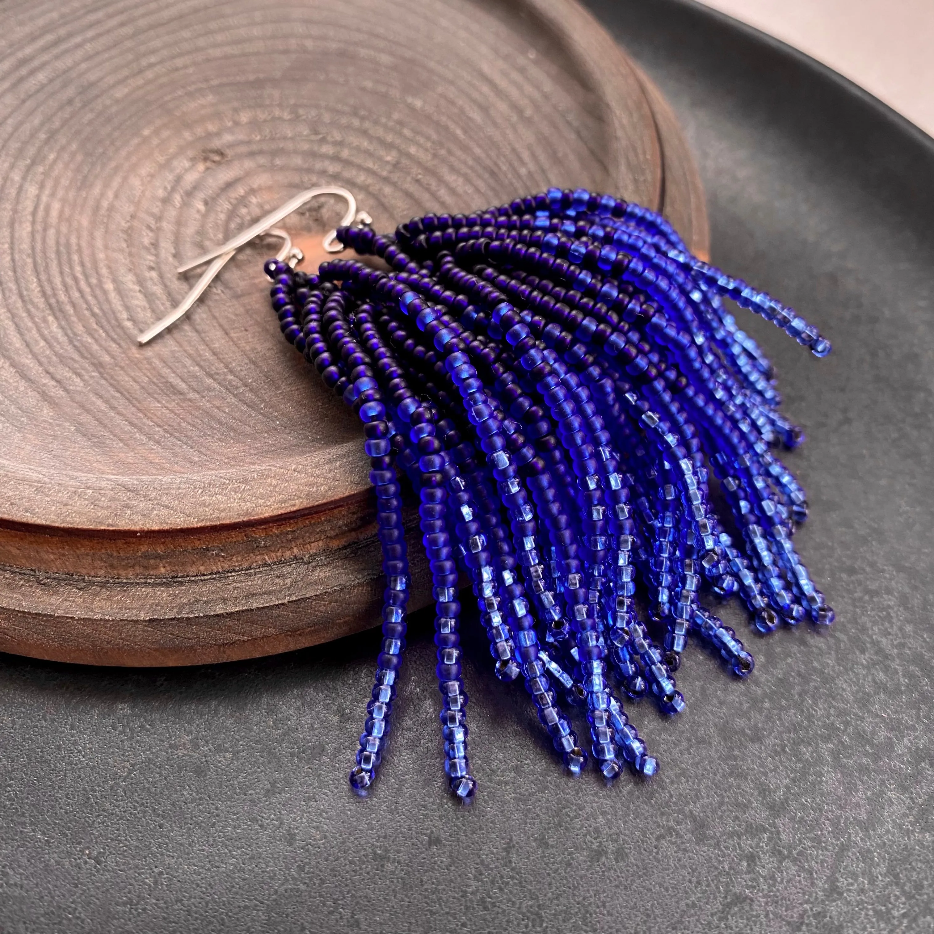 Handmade Blue Ombre Seed Bead Tassel Earrings for Women in boho hippie style.