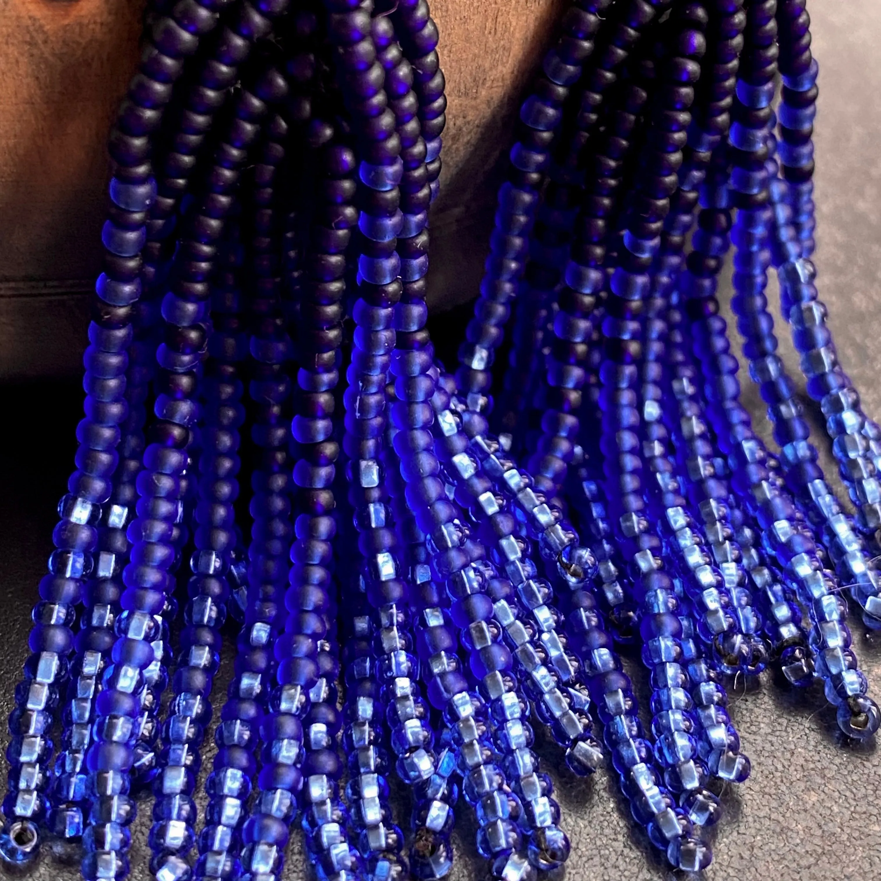 Handmade Blue Ombre Seed Bead Tassel Earrings for Women in boho hippie style.