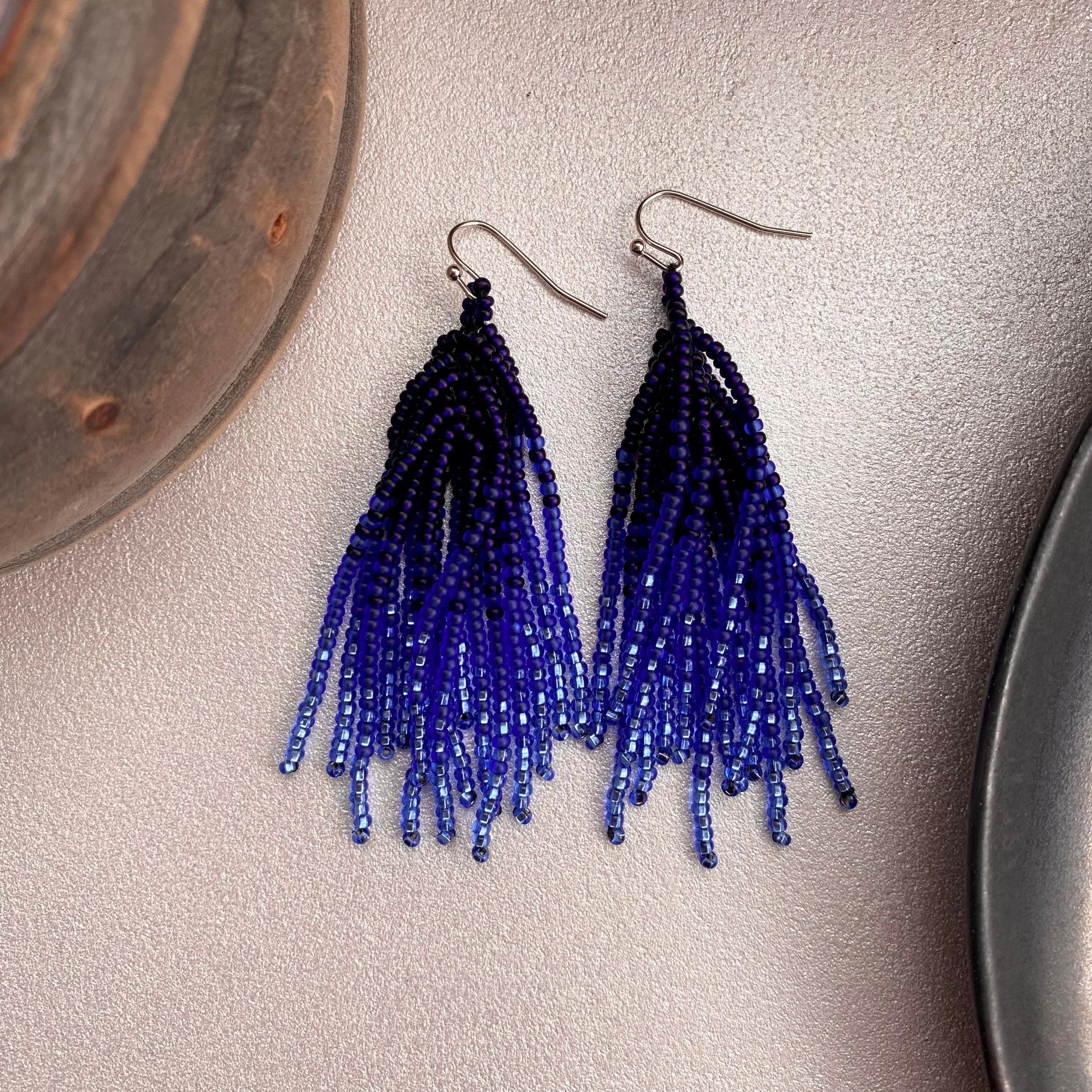 Handmade Blue Ombre Seed Bead Tassel Earrings for Women in boho hippie style.