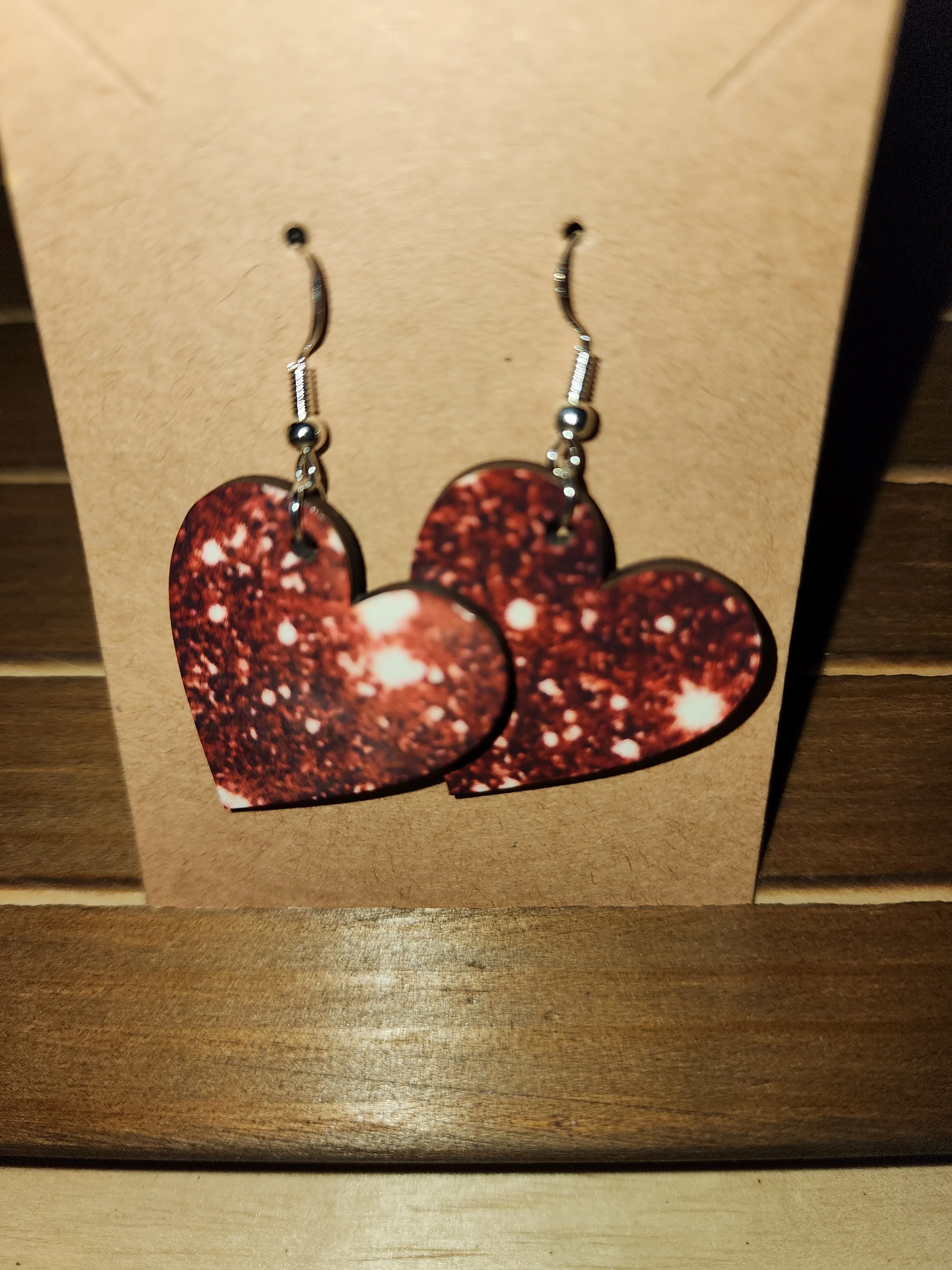 Red sparkle effect heart earrings